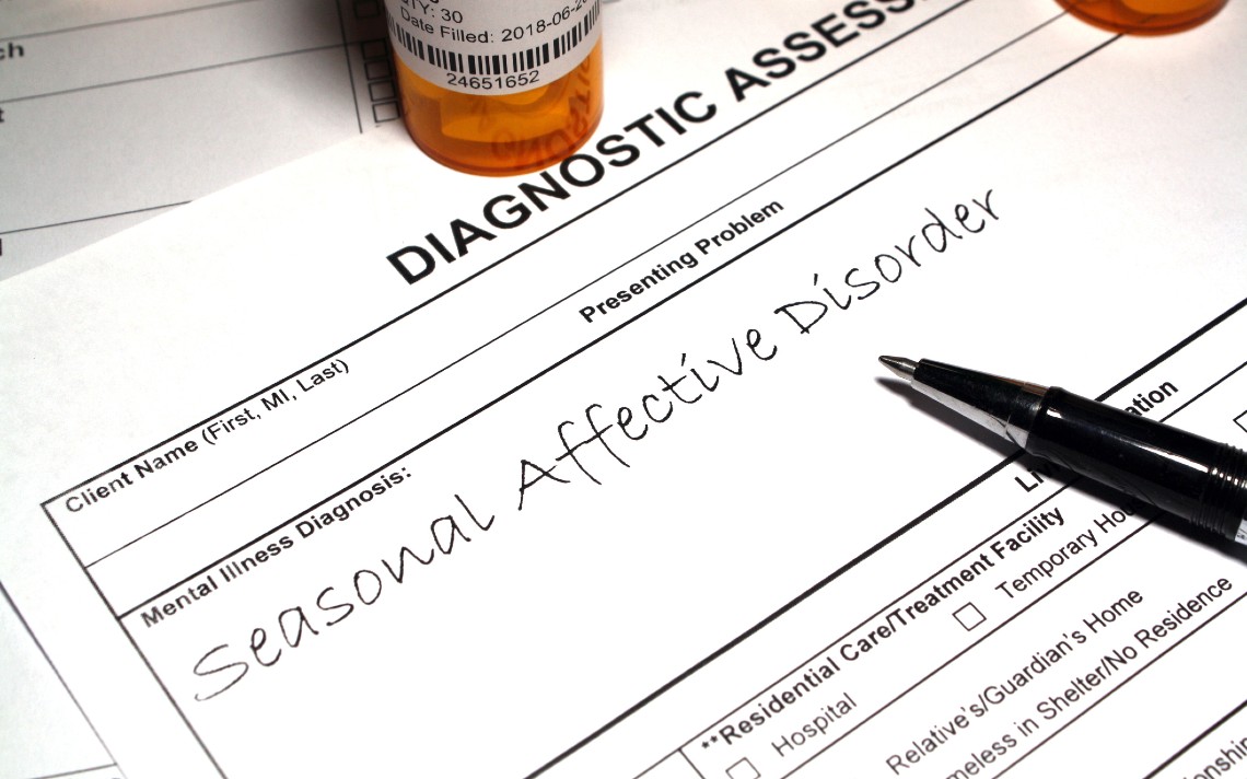 A physician's patient assessment pad with Seasonal Affective Disorder as the diagnosis